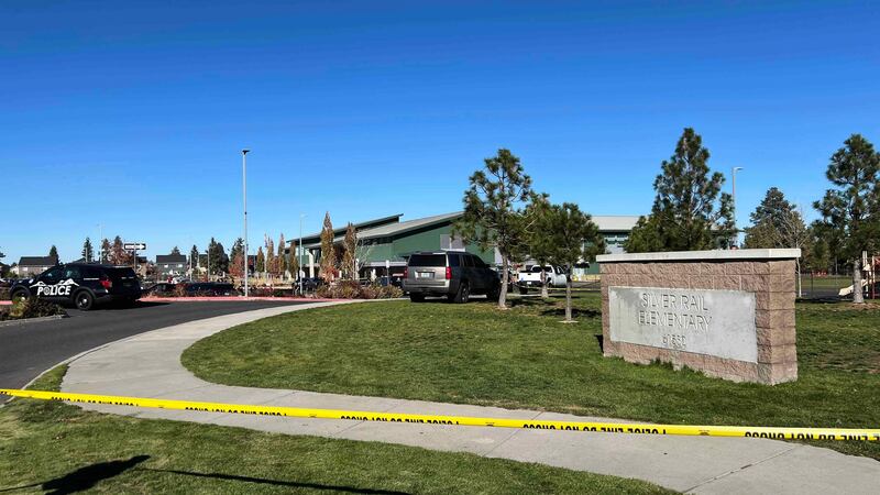 Police tape is placed outside Silver Rail Elementary school, where a shooting took place, on...